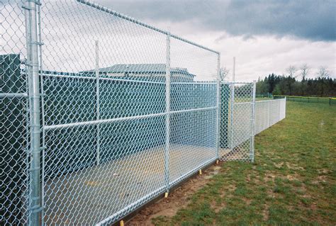 Build a chain link barbwire fence. Vancouver Chain Link Fences - Fenceman Fence Company ...