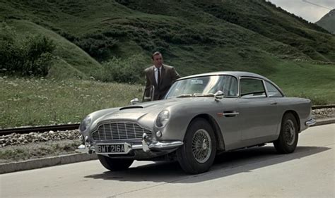 Bonds Goldfinger Hacking Jacket And Db5 Aston Martin Db5 Bond Cars