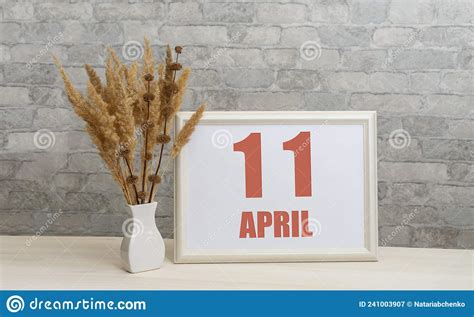 April 11 11th Day Of Month Calendar Date White Vase With Ikebana And