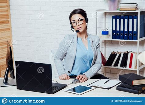 Business Girl Secretary Sits In A White Office Call Center Stock Photo ...