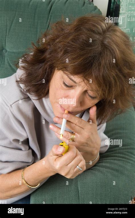 Middle Aged Woman Smoking Cigarette High Resolution Stock Photography