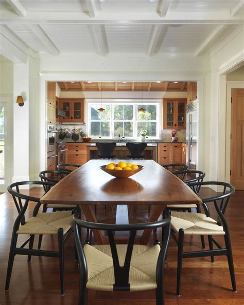 Neatly concealed behind drawer fronts, options include fold. Cool dinette chairs in Dining Room Beach Style with White ...