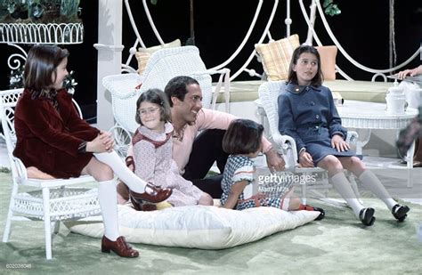 Musician Paul Anka Sits With Four Of His Daughters During A Photo