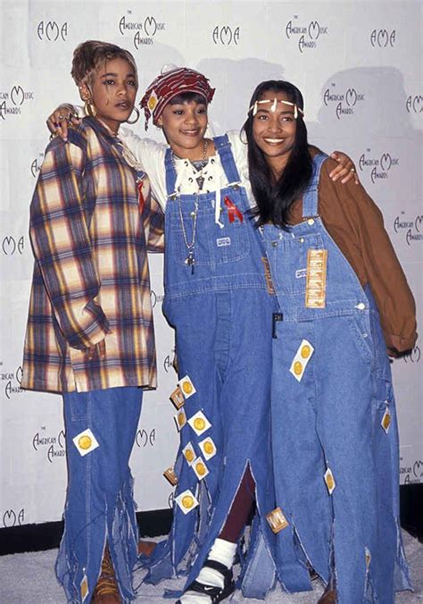 tlc also wearing overalls this time with condoms all over them tlc outfits 90s fashion