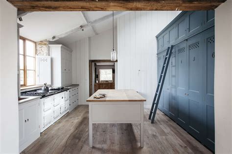 In our wellsdown kitchen in hythe, kent, two ovens were integrated into the back wall of cabinetry, and there is actually a tall refrigerator and a super useful. Kitchen of the Week: The Plain English Power in Numbers ...