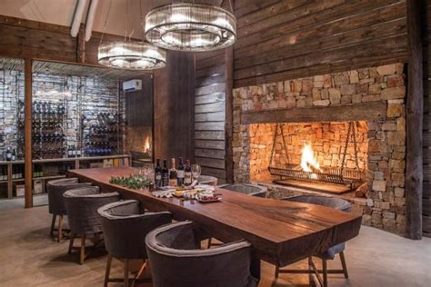 Warm Rustic Dining Room With Stone Fireplace Hgtv