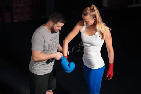 The Coach Puts On The Boxing Gloves Girl Stock Photo Image Of Gloves