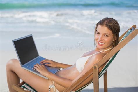 Smiling Woman Relaxing In Deck Chair On The Beach Using Laptop Stock Image Image Of Vacation