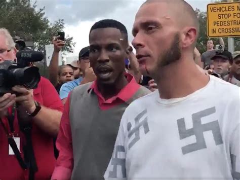 Man Wearing Shirt Covered In Swastikas Gets Punched In Head Outside Richard Spencer Speech The