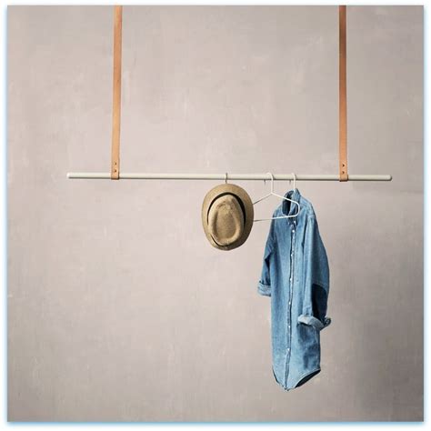 Our adjustable ceiling mounted hanging clothes rack assembles in minutes and offers up to 32 of hanging space for your home or retail store. Modern Hanging Clothes Rack - Adjustable | Laundry Shoppe