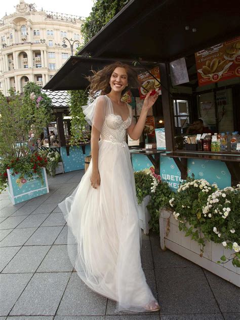 A Line Wedding Gown With Butterfly Sleeves And Embroidered Sweetheart
