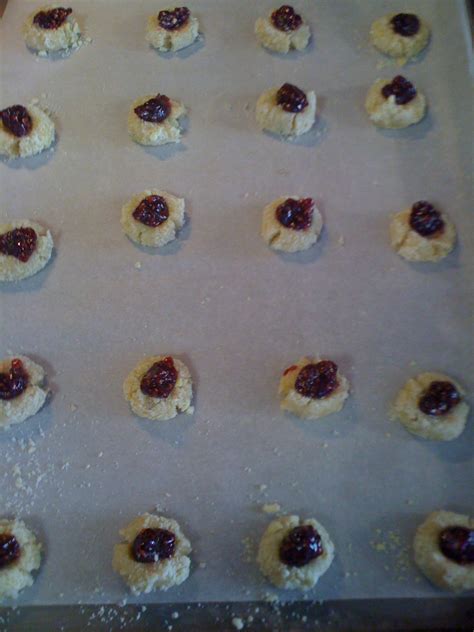 Add vanilla extract and egg yolk, mixing until fluffy. The Hungry Momma: Austrian Jam Cookies