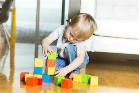 Kid Playing Toy Blocks Inside His House Stock Photo Image Of Game