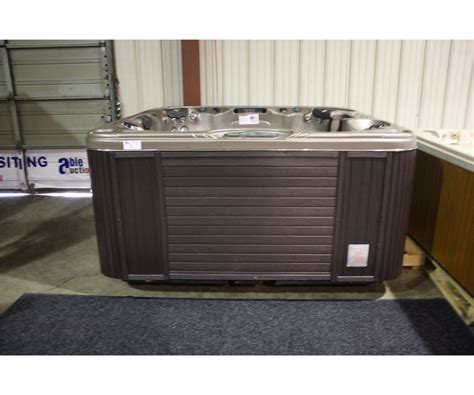 84 X 84 Cal Spas Diamond Series Hot Tub With Cinnabar Interior And Preferred Smoke Cabinet