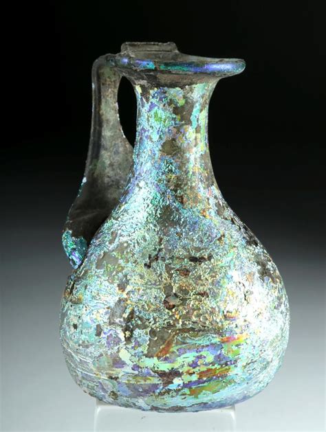 Sold At Auction Roman Glass Pitcher W Stunning Iridescence Roman Glass Antique Glass Antiques