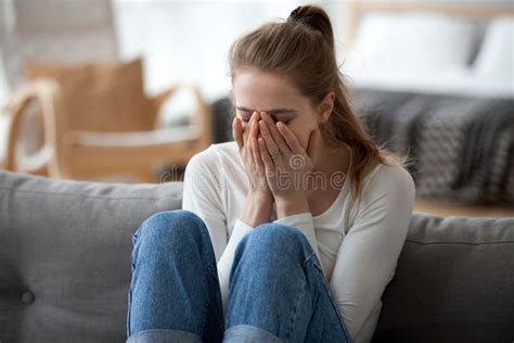 Upset Girl Sit On Sofa Crying After Breakup Stock Image Image Of