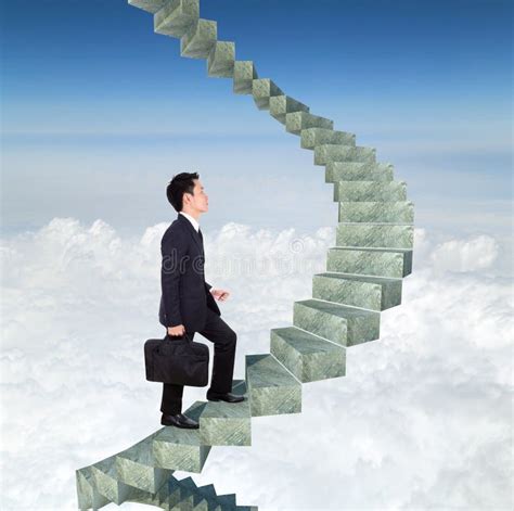 Business Man Going Upstairs In A Curved Staircase To Success Wit Stock