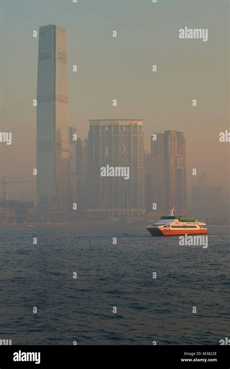 Sunrise Over Victoria Harbour Hong Kong With Ferrys Crossing And The