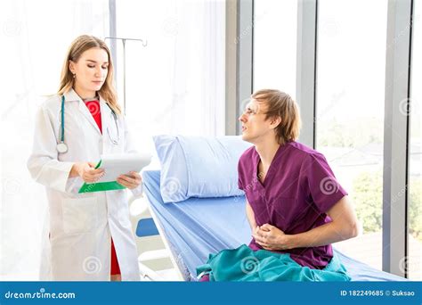 Patient Had Abdominal Pain Sitting On A Patient Bed Stock Image Image