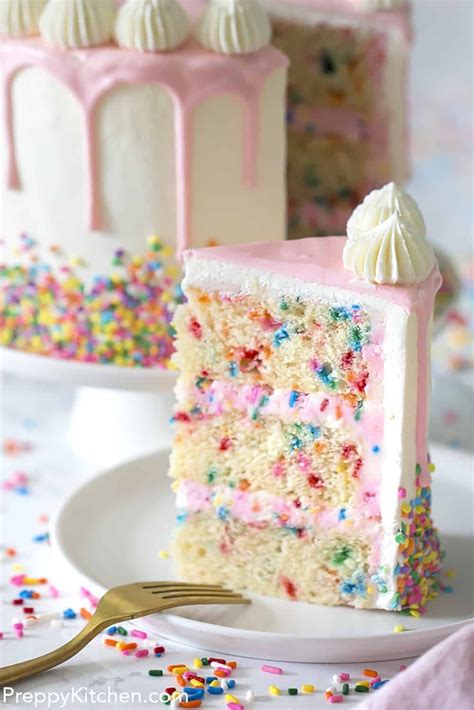A Moist Vanilla Cake Filled With Sprinkles Coated In Silky Italian