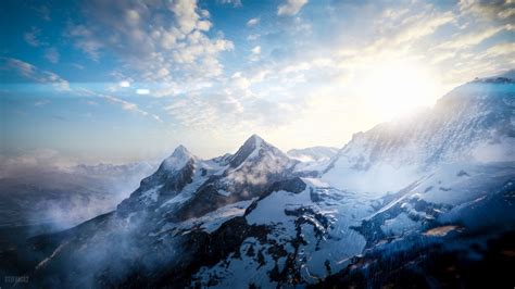 Download Wallpaper 1366x768 Mountains Peaks Sky Snowy View From