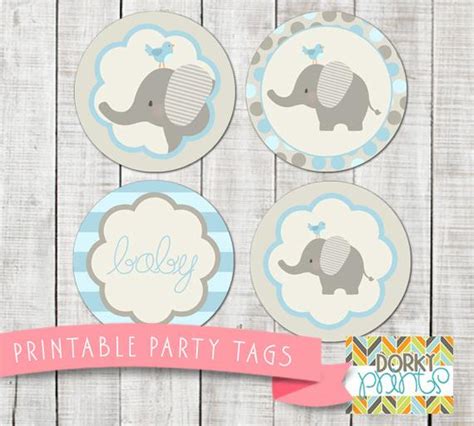 Here are lots of free printable baby shower games to use at your next party!! Blue Elephant Baby Shower Printable Circle Tags PDF