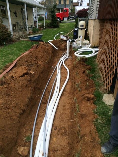 Laying In All The Water Lines And Electrical Conduit Pool Installation
