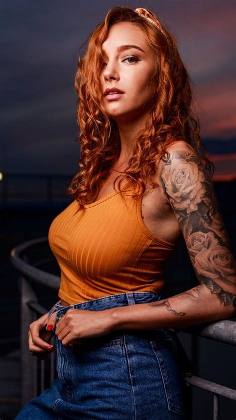 750x1334 Woman With Tattoo Redhead Wallpaper Women Redhead Most
