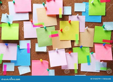 Colorful Sticky Notes On Cork Bulletin Board Royalty Free Stock Photo