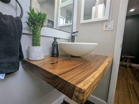 You may install a bathroom wall unit if you want to increase the available floor space. Custom live edge slab floating bathroom vanity. | Floating ...