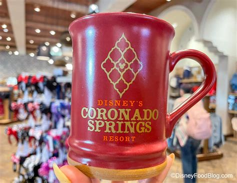 What S New At Disney World Hotels A Beignet Mug And Fun Suitcases The Disney Food Blog