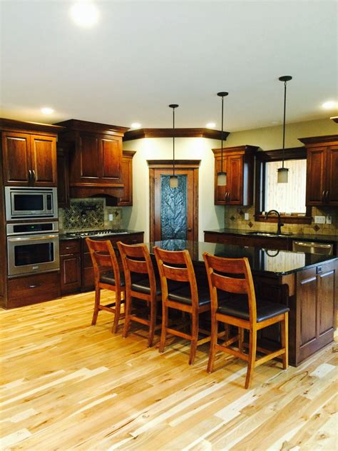 Hickory wood cabinets have a naturally golden brown color with dark grain lines, offering a very nice natural pattern that can. Hickory floors, cherry cabinets | Kitchen projects ...
