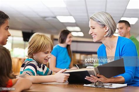 Checking Out Library Books Photos And Premium High Res Pictures Getty