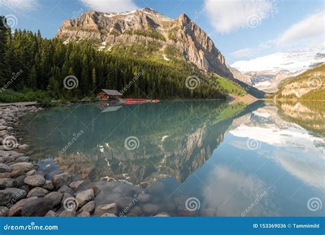Mountain Reflection In Turquoise Blue Lake Water Stock Photo Image Of