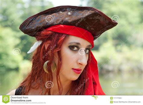Female Pirate Girl With Red Bandanna And Beautiful Face Stock Image