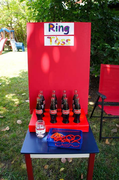 How to play the santa's hat ring toss carnival game: Ring toss game with Coke bottles for carnival birthday ...