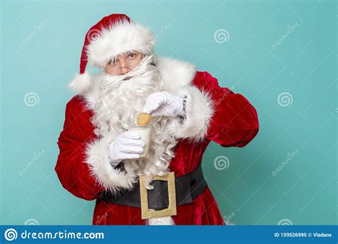 Santa Claus Holding Milk And Cookies Stock Image Image