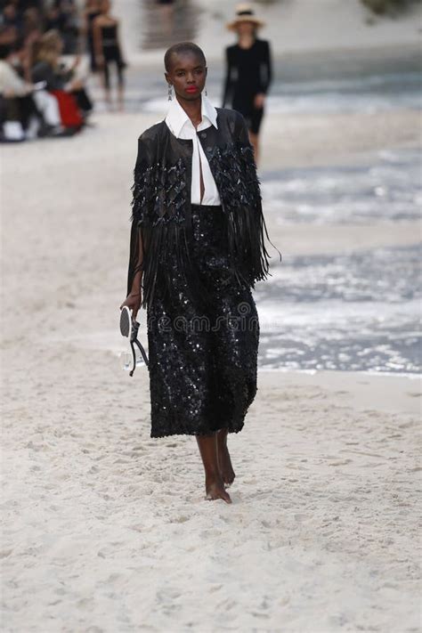 A Model Walks The Runway During The Chanel Show As Part Of The Paris