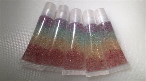 Gloss is usually sold in liquid or soft solid form and may be flavored, glittery, opalescent, shiny, or metallic. DIY GLITTER LIP GLOSS (THE RAINBOW) - YouTube