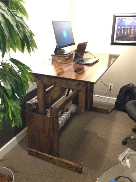 Standing desks are becoming more popular than ever, as people learn about the health hazards of sitting all day long. I built my own sit-stand desk complete with counterweight ...