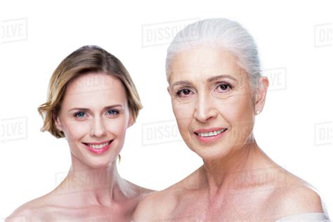Naked Adult Daughter And Mother Isolated On White Purity Concept Stock Photo Dissolve