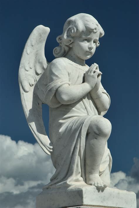 Photo 541 01 A Young Angel Cherub Sitting On A Cloud In St