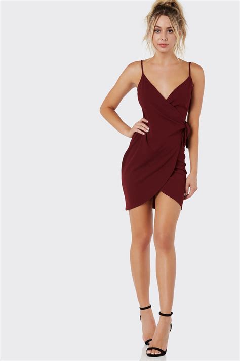 Sleeveless Wrap Dress With Bold Knot Detailing Flattering Fit With Tulip Hem Finish Wrap