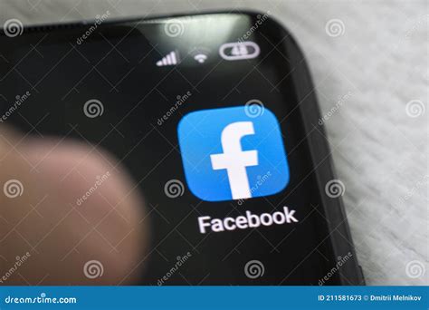 Facebook Application On Screen Of An Smartphone Editorial Stock Photo