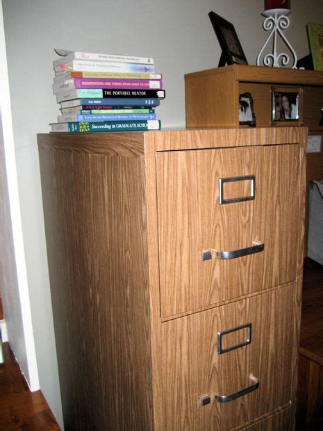 I spent a lot of lunch hours, weekend nights, and downtime working with contact paper. File Cabinet Makeover: How to Cover a File Cabinet With ...