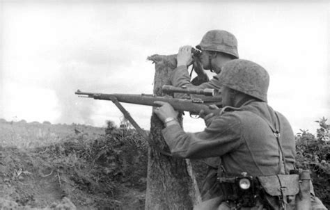 World War Ii History A German Sniper Carrying Kar98k With 4x Zeiss
