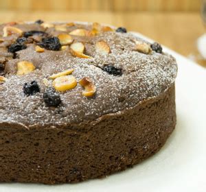 Finally, add in coconut flakes and pecans. Pressure Cooker Eggless Chocolate Nuts Cake Recipe ...