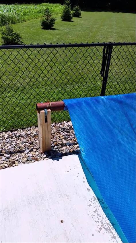 Diy pool cover using pvc and a tarp to keep the water and leaves out of the pool and to make spring opening easier! Homemade solar cover reel | Pool cover roller, Solar pool ...