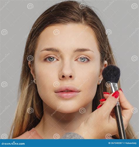 Makeup Artist Or Stylist Applies Eyeshadow Powder Or Shadows To The
