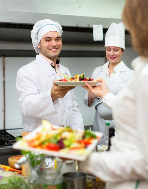 Chefs And Young Waiter Stock Image Image Of Colleagues 57935373